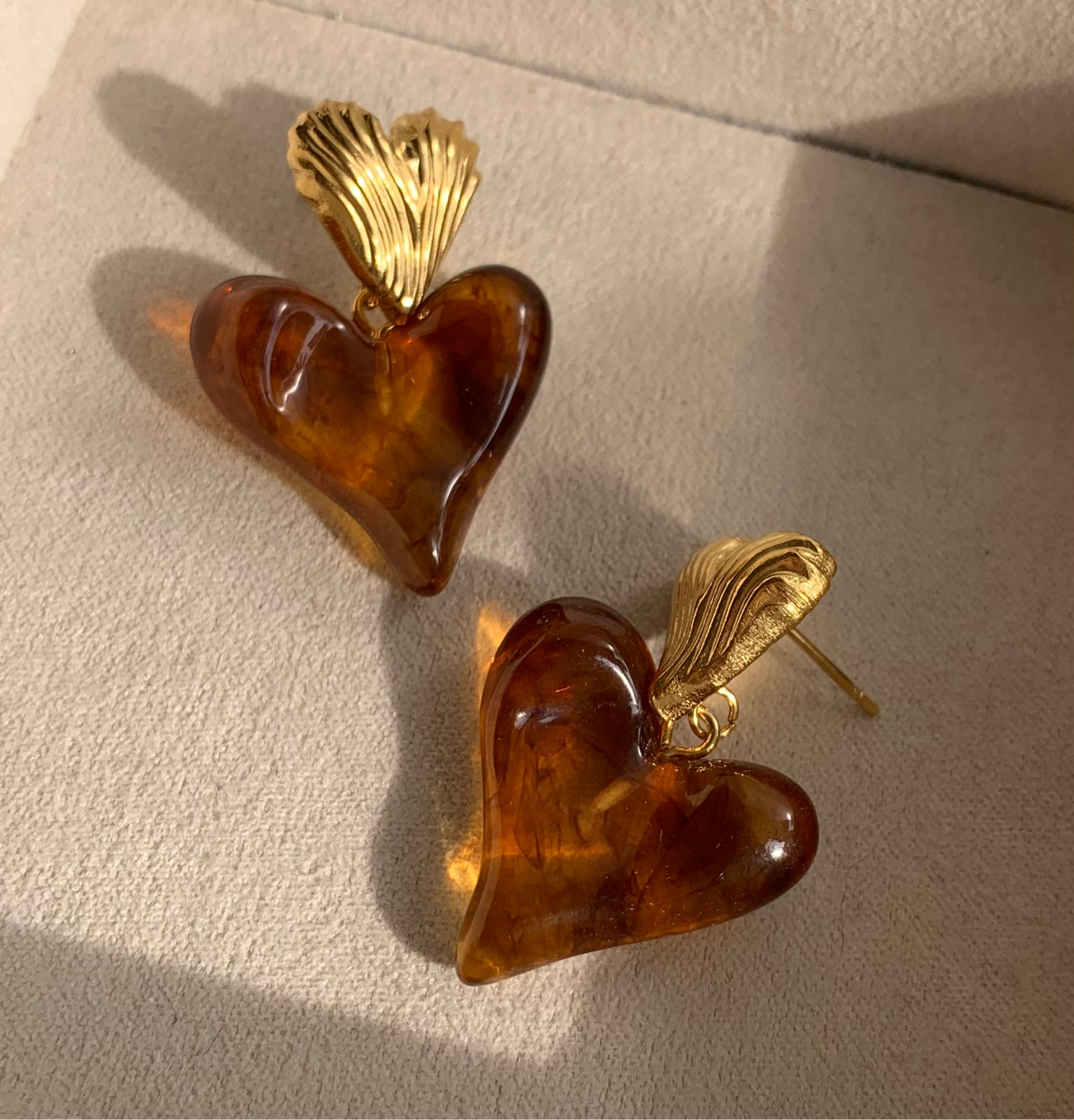 Double heart golden brown earrings