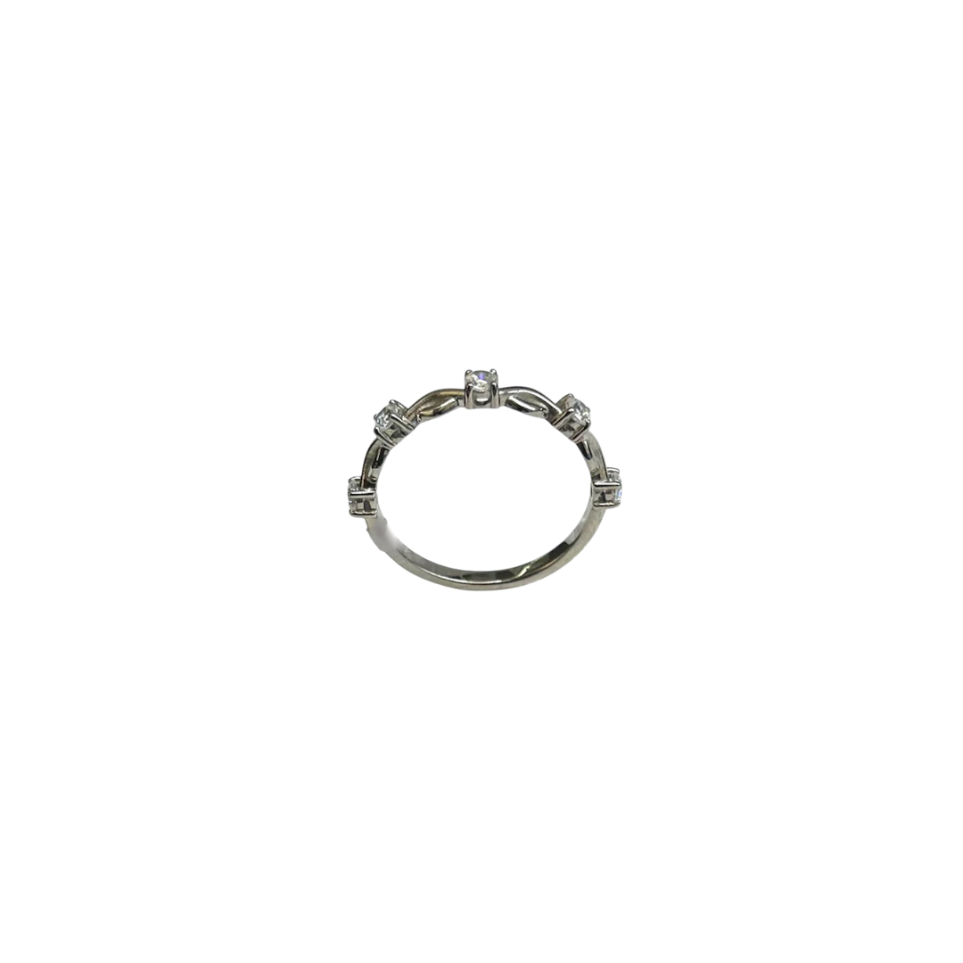 Anillo entrelazado con zirconia 10k