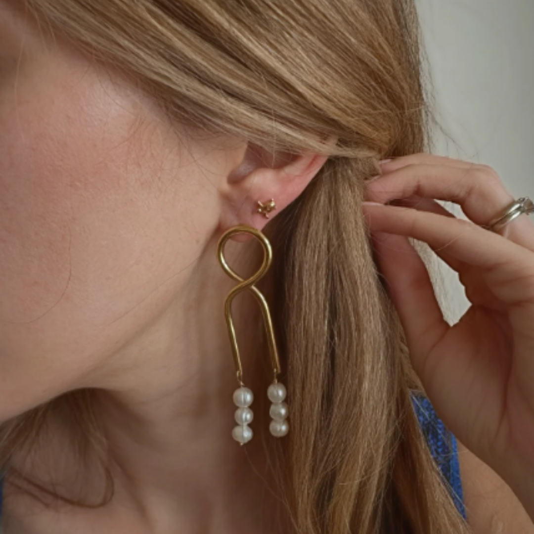 Gold knot pearl drop earrings