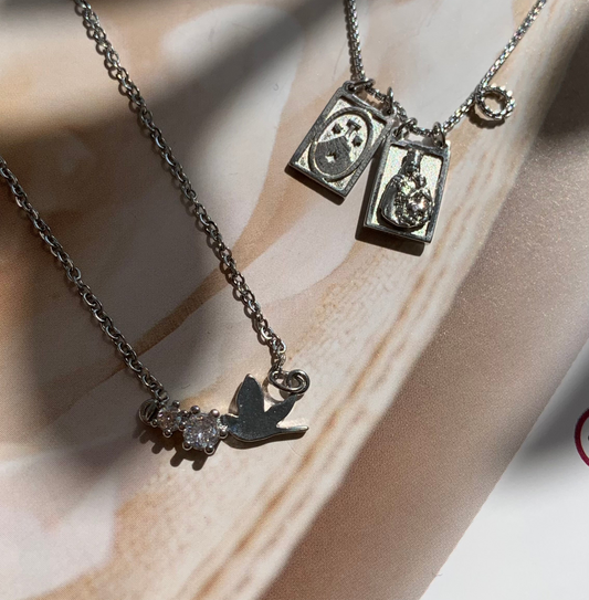 Silver holy spirit necklace