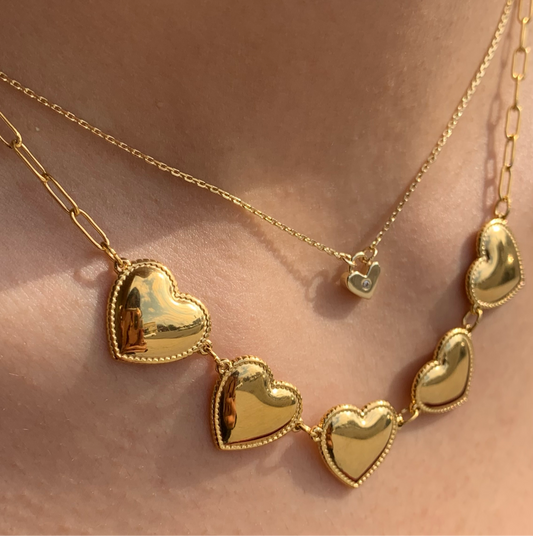 Five hearts golden necklace
